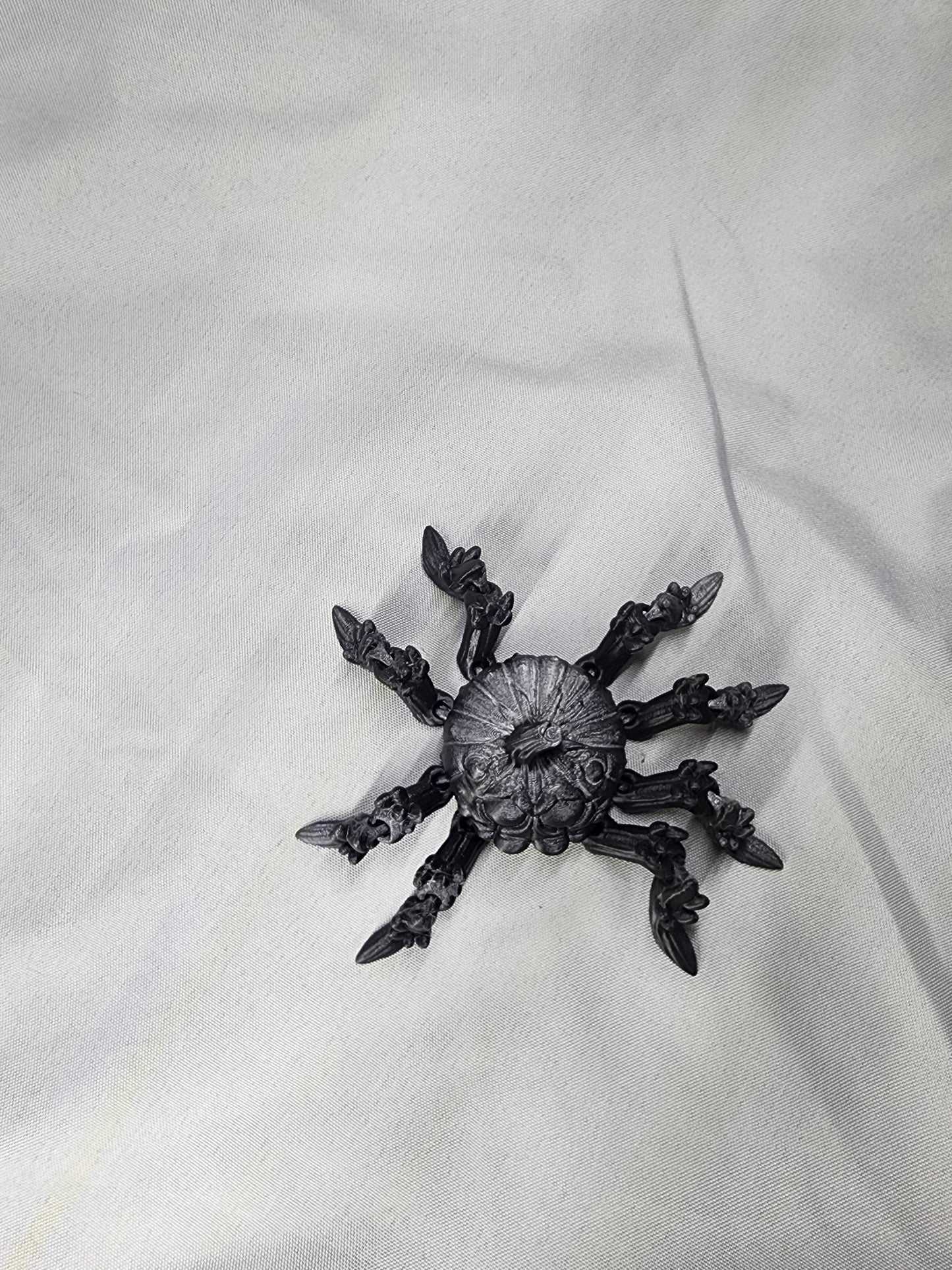 Pumpkin Spider articulating figurine is a great addition to your creepy Halloween decor and fun to play with