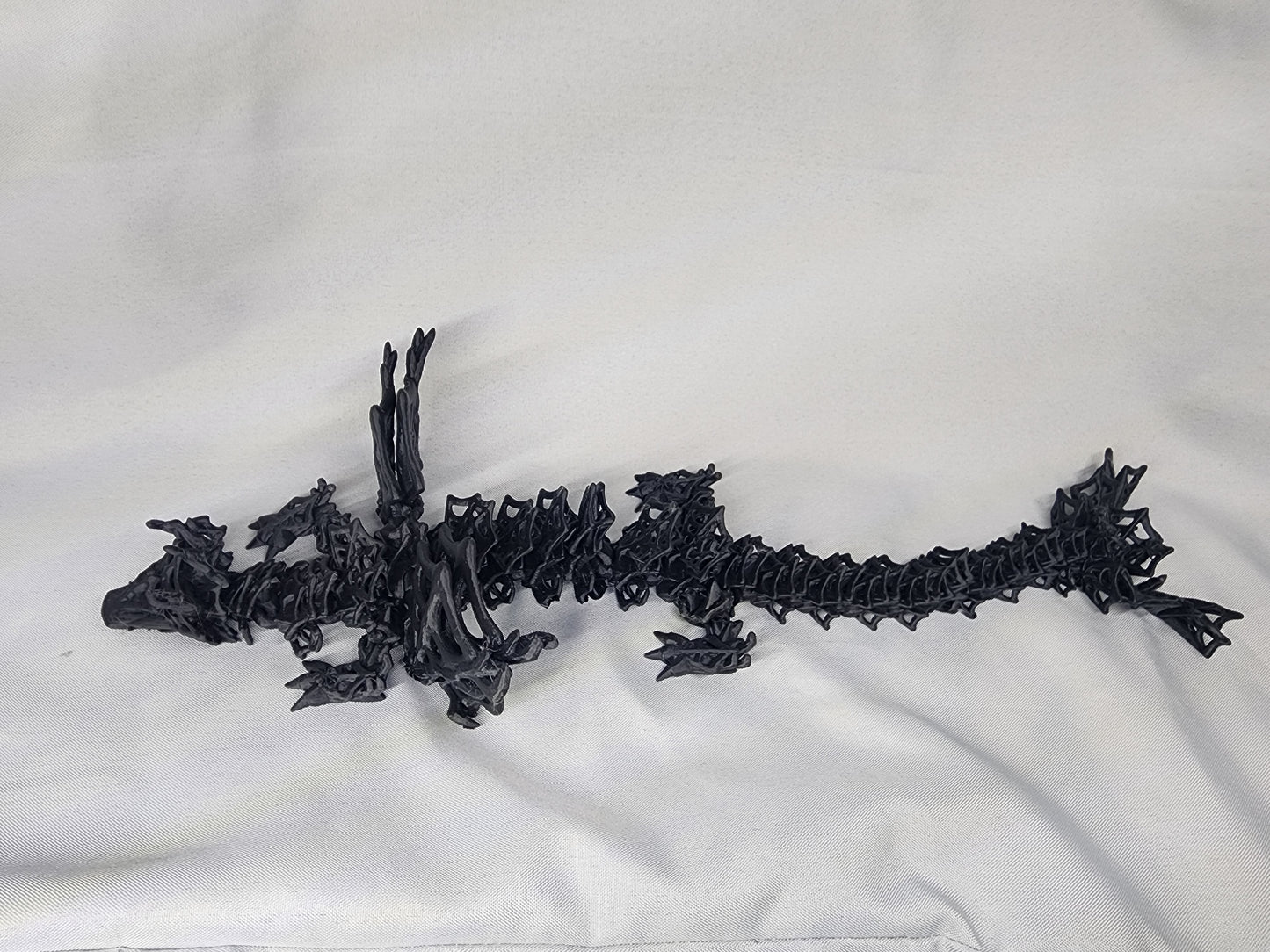 Wicked Winged Dragon articulating figurine is a must have with its awesome spiderweb features