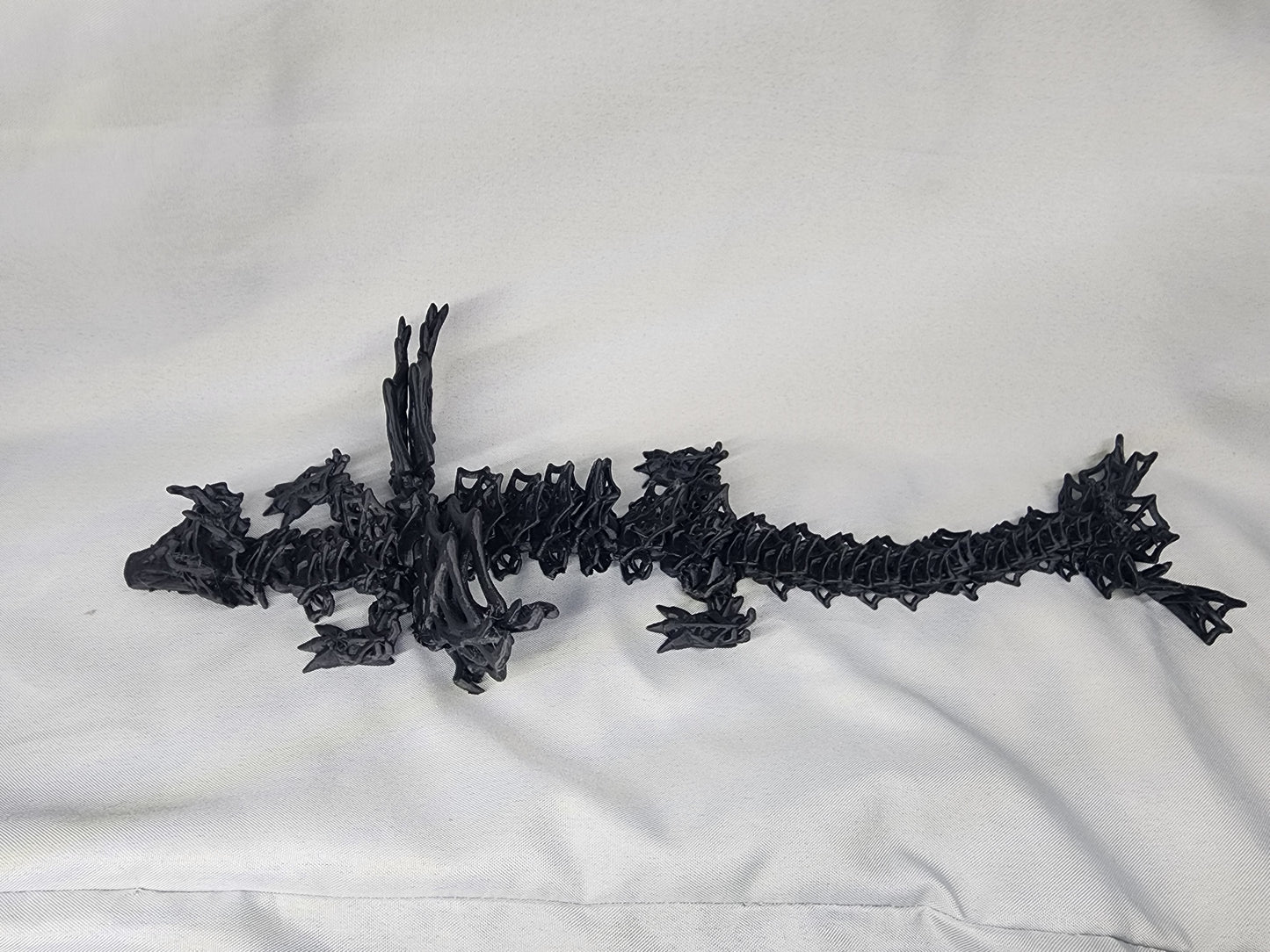 Wicked Winged Dragon articulating figurine is a must have with its awesome spiderweb features