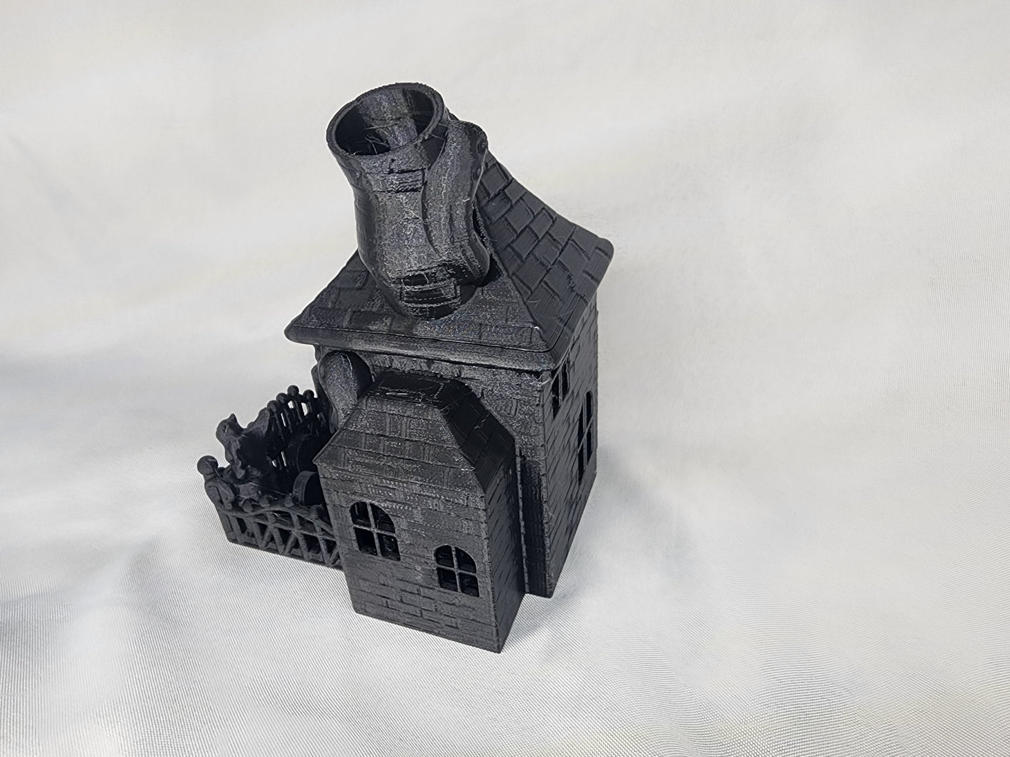 Haunted House Dice Tower is the perfect decoration and dice game accessory for Halloween or year-round.