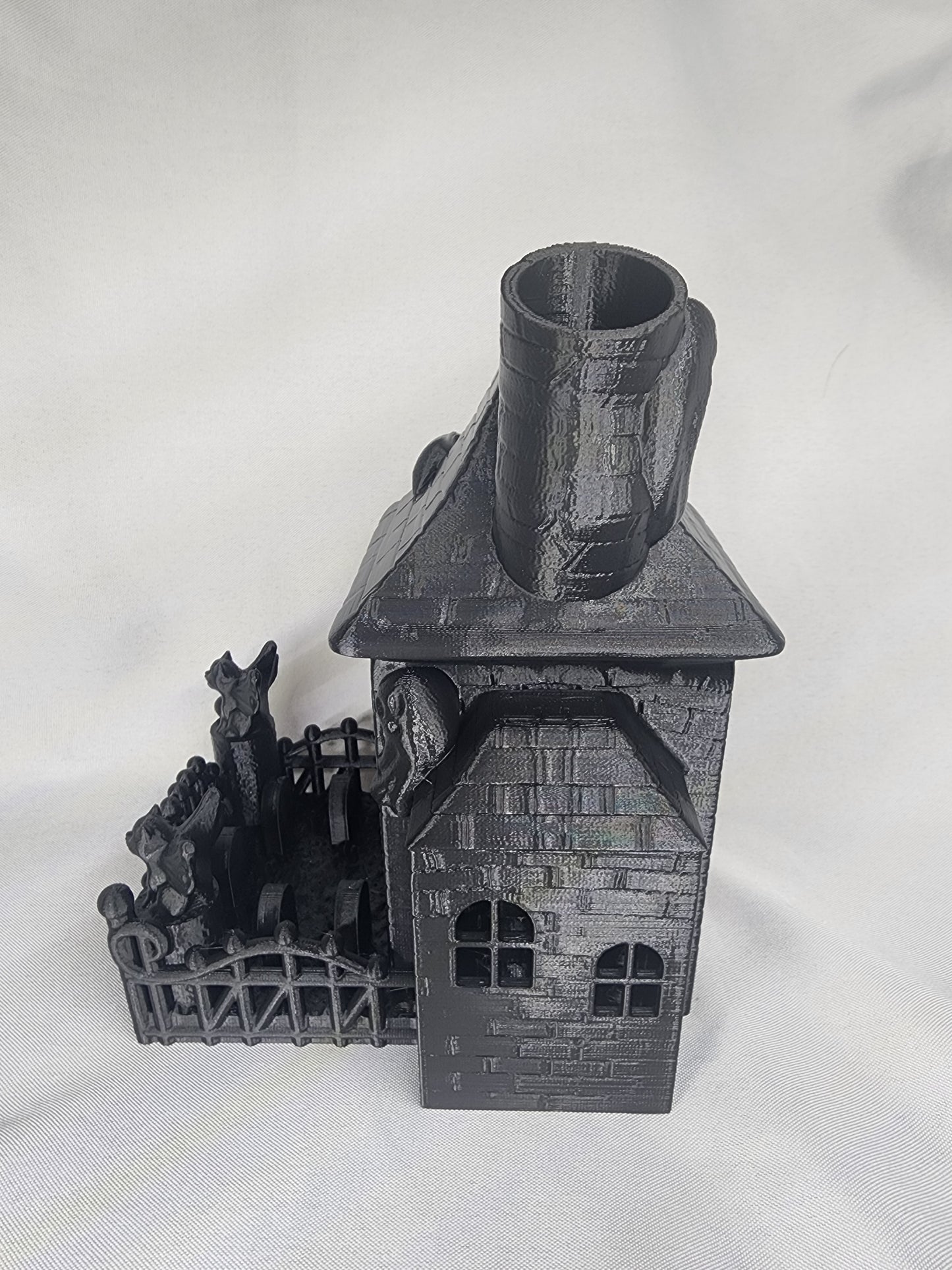 Haunted House Dice Tower is the perfect decoration and dice game accessory for Halloween or year-round.