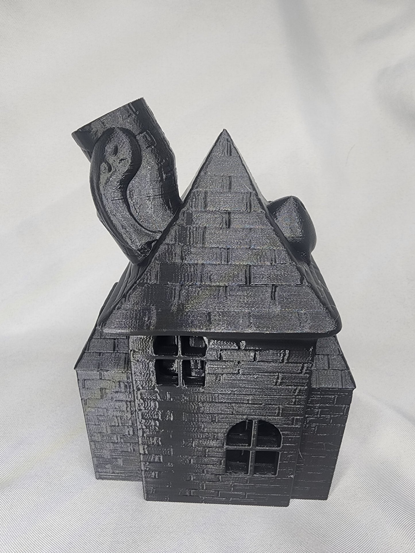 Haunted House Dice Tower is the perfect decoration and dice game accessory for Halloween or year-round.