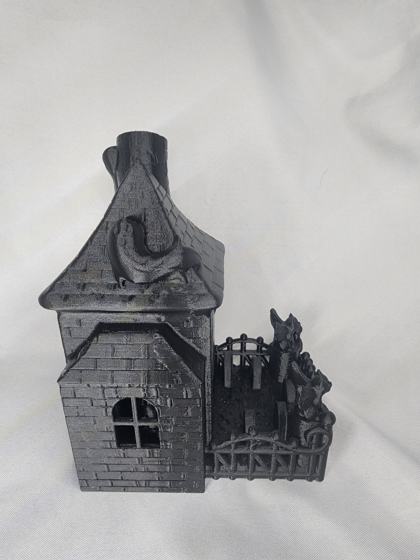 Haunted House Dice Tower is the perfect decoration and dice game accessory for Halloween or year-round.