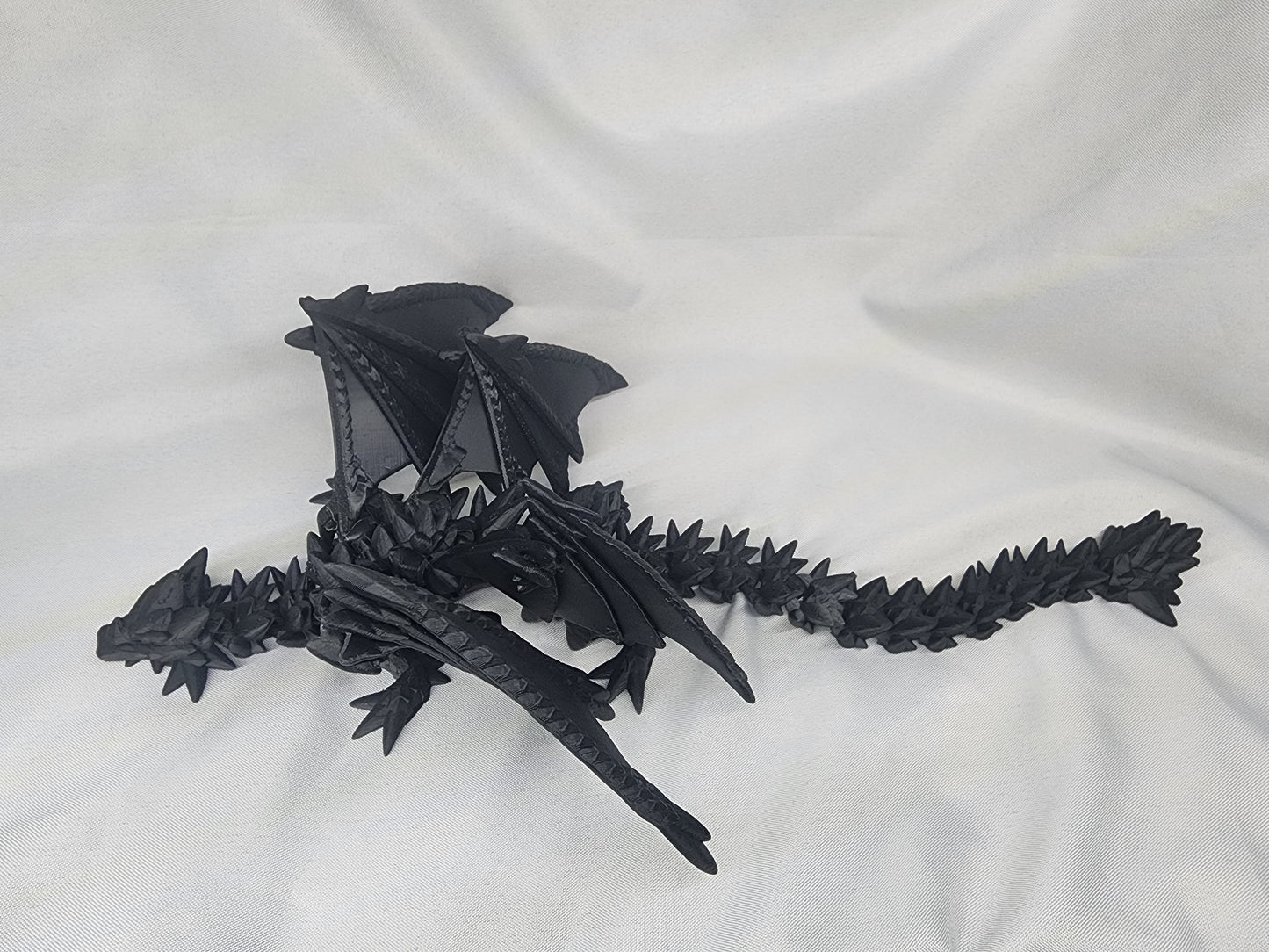 Spike Dragon articulating figurine is the coolest quad-wing dragon you could image and is a must have for the dragon collector