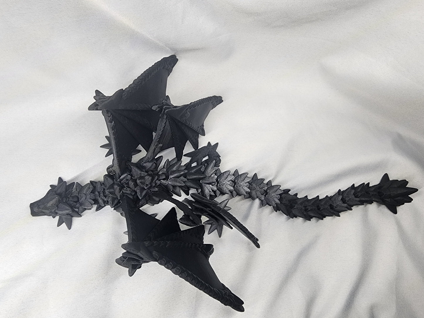 Spike Dragon articulating figurine is the coolest quad-wing dragon you could image and is a must have for the dragon collector