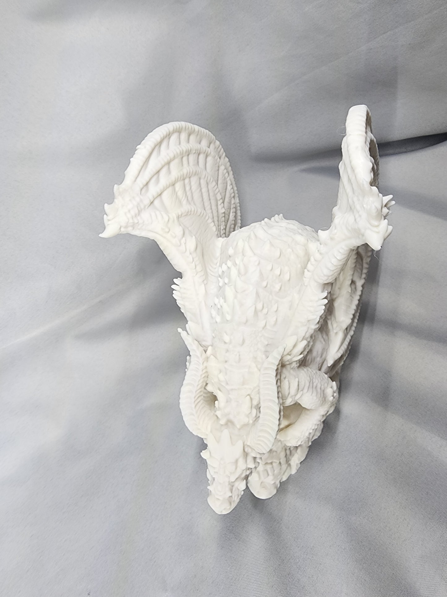 Dragon perched on skull decoration for home or office whether it's Halloween or any other time of year