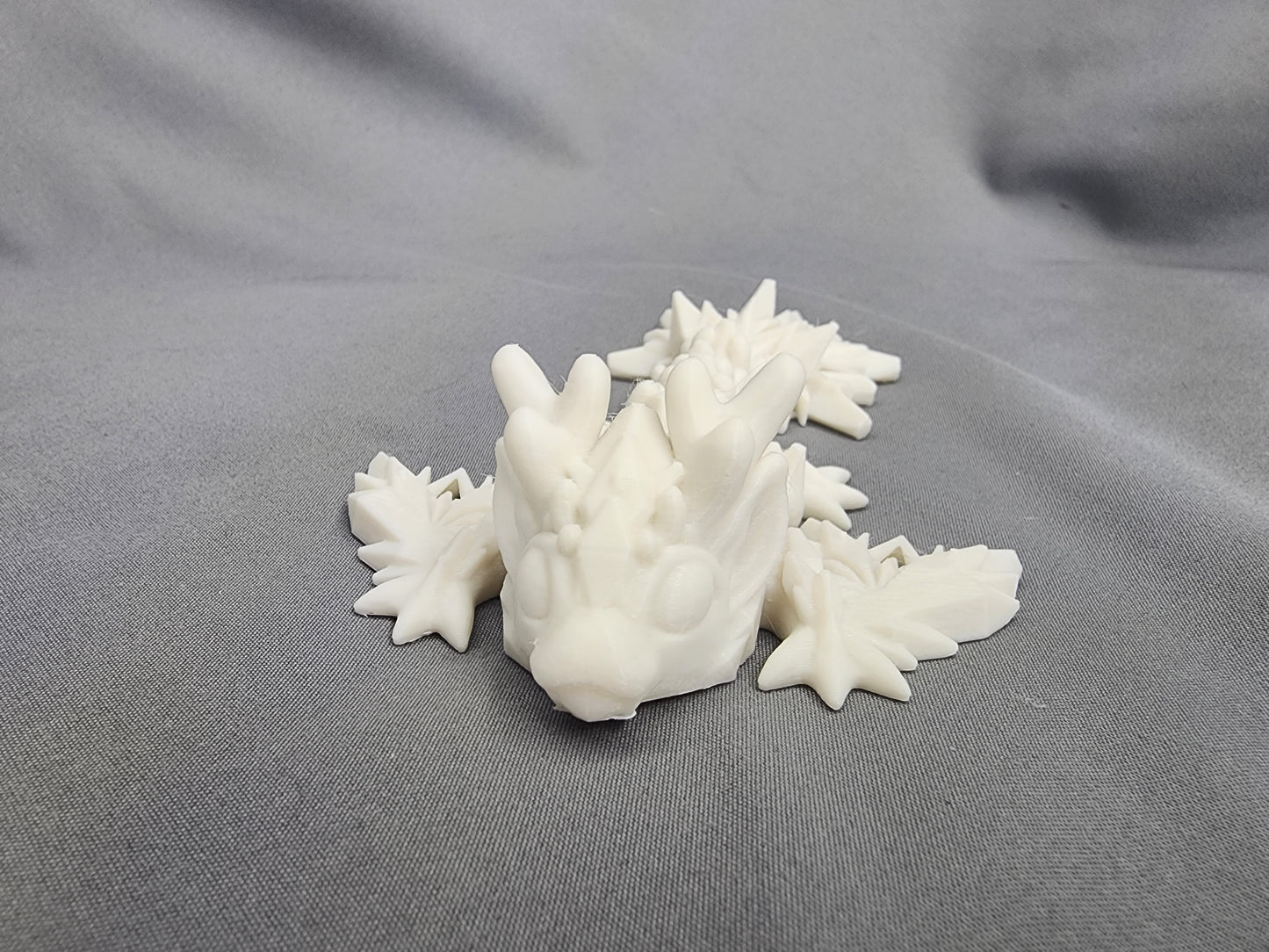 Tiny Winter Wyvern articulating figurine