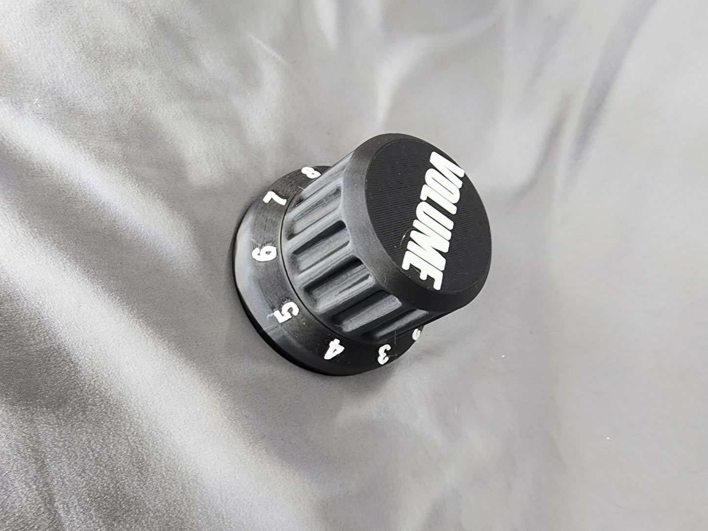 Volume Knob Container is the perfect gift that holds everything from guitar picks to 9v batteries for your pedal