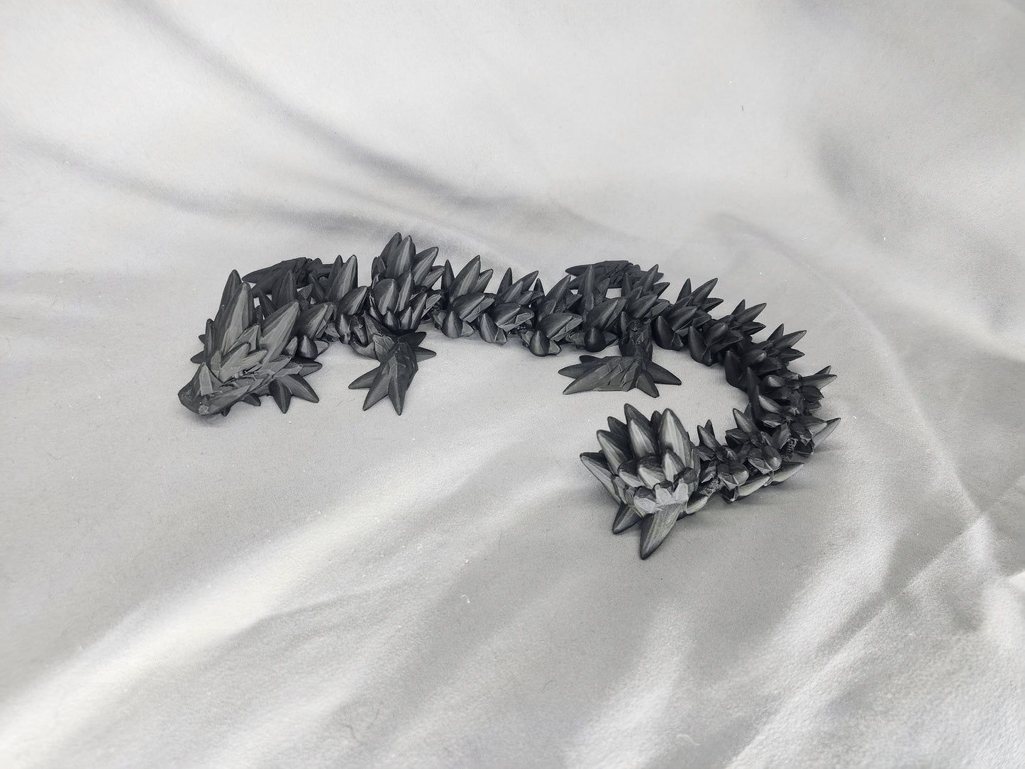 Spike Dragon articulating figurine is the coolest quad-wing dragon you could image and is a must have for the dragon collector
