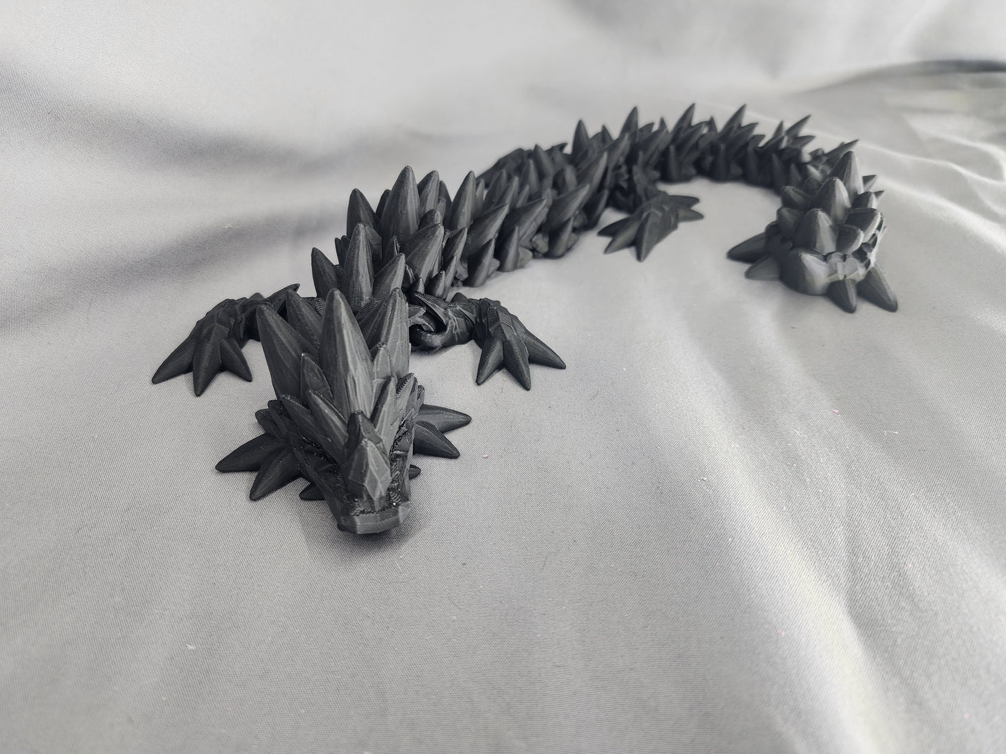 Spike Dragon articulating figurine is the coolest quad-wing dragon you could image and is a must have for the dragon collector