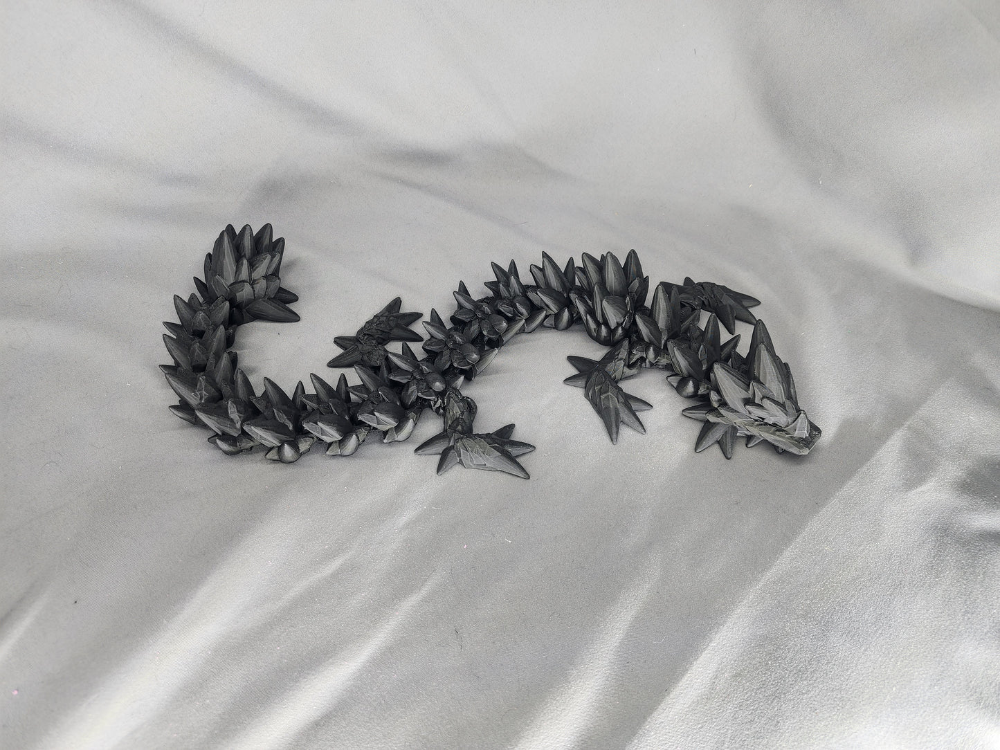 Spike Dragon articulating figurine is the coolest quad-wing dragon you could image and is a must have for the dragon collector