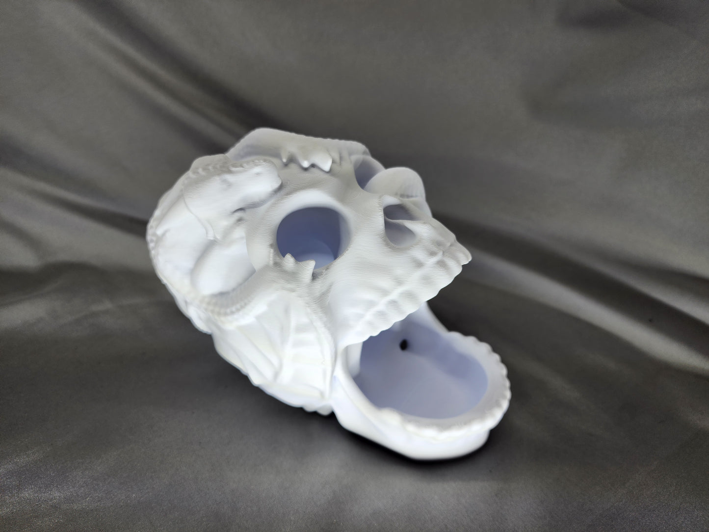 Skull & Dragon Dice Tower doubles as decor to impress friends and family with your dice rolling skills and eccentric gothic vibe
