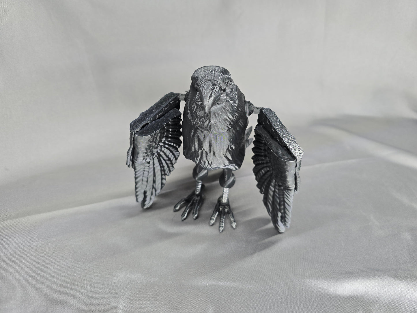 Raven articulating figurine and decoration will keep an eye on everything