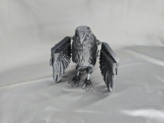 Raven articulating figurine and decoration will keep an eye on everything