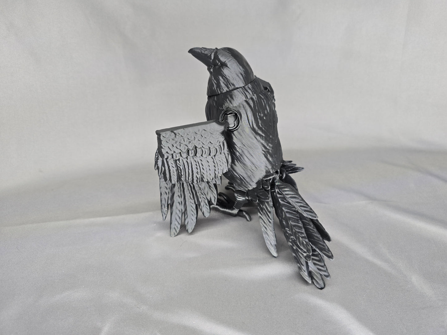 Raven articulating figurine and decoration will keep an eye on everything