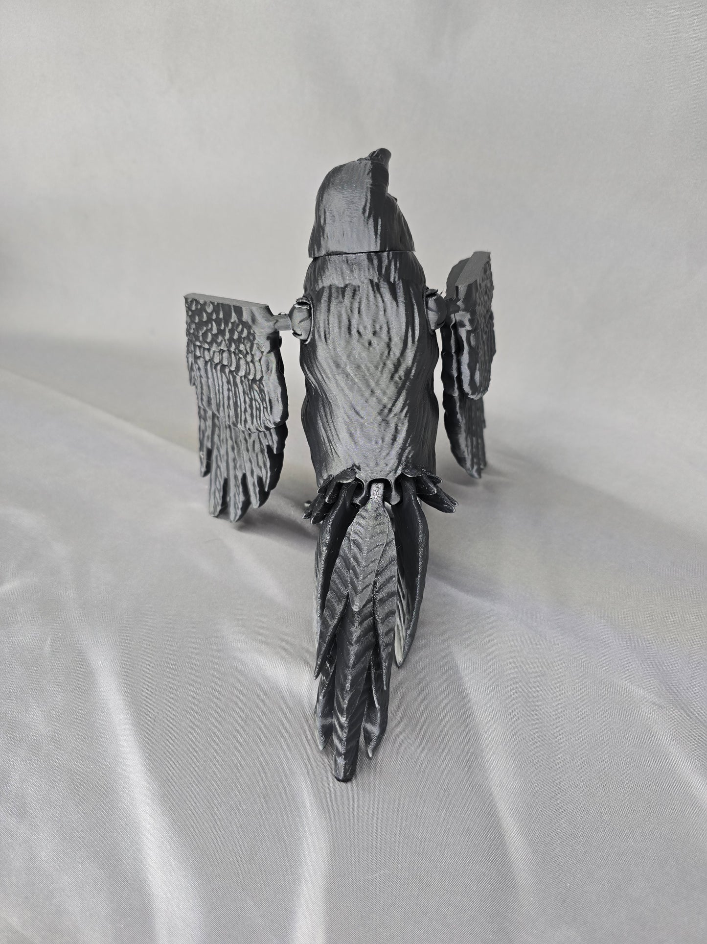 Raven articulating figurine and decoration will keep an eye on everything