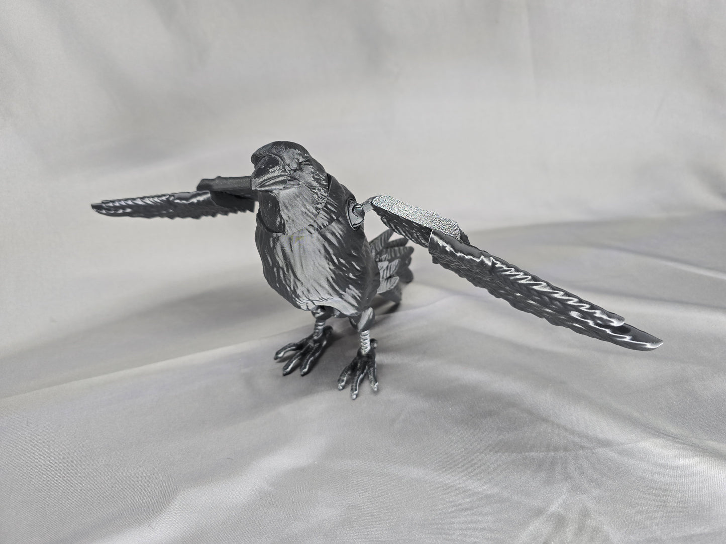 Raven articulating figurine and decoration will keep an eye on everything