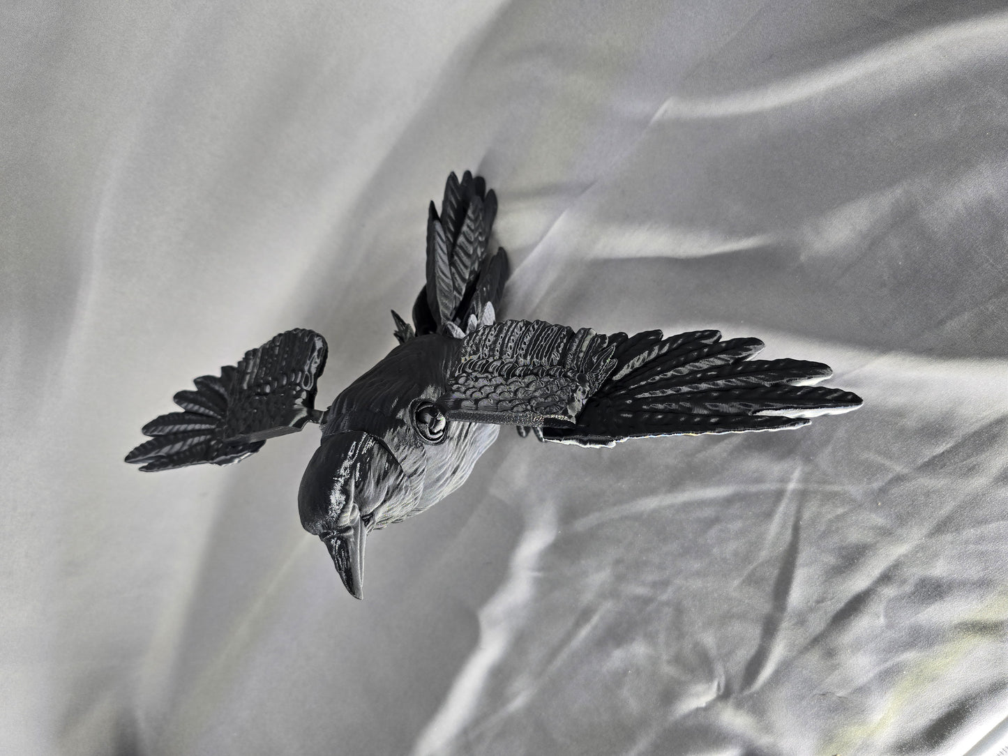 Raven articulating figurine and decoration will keep an eye on everything