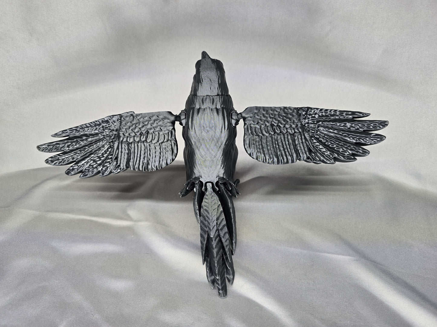 Raven articulating figurine and decoration will keep an eye on everything