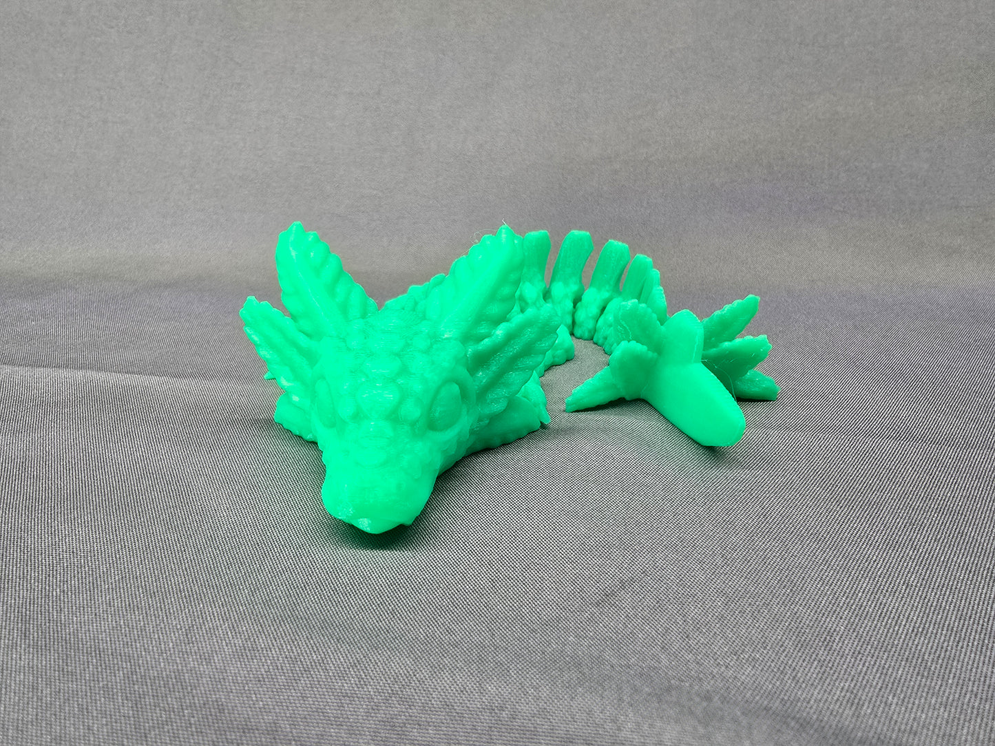 Axolotl Baby Dragon articulating figurine is an adorable fun fidget toy and decoration