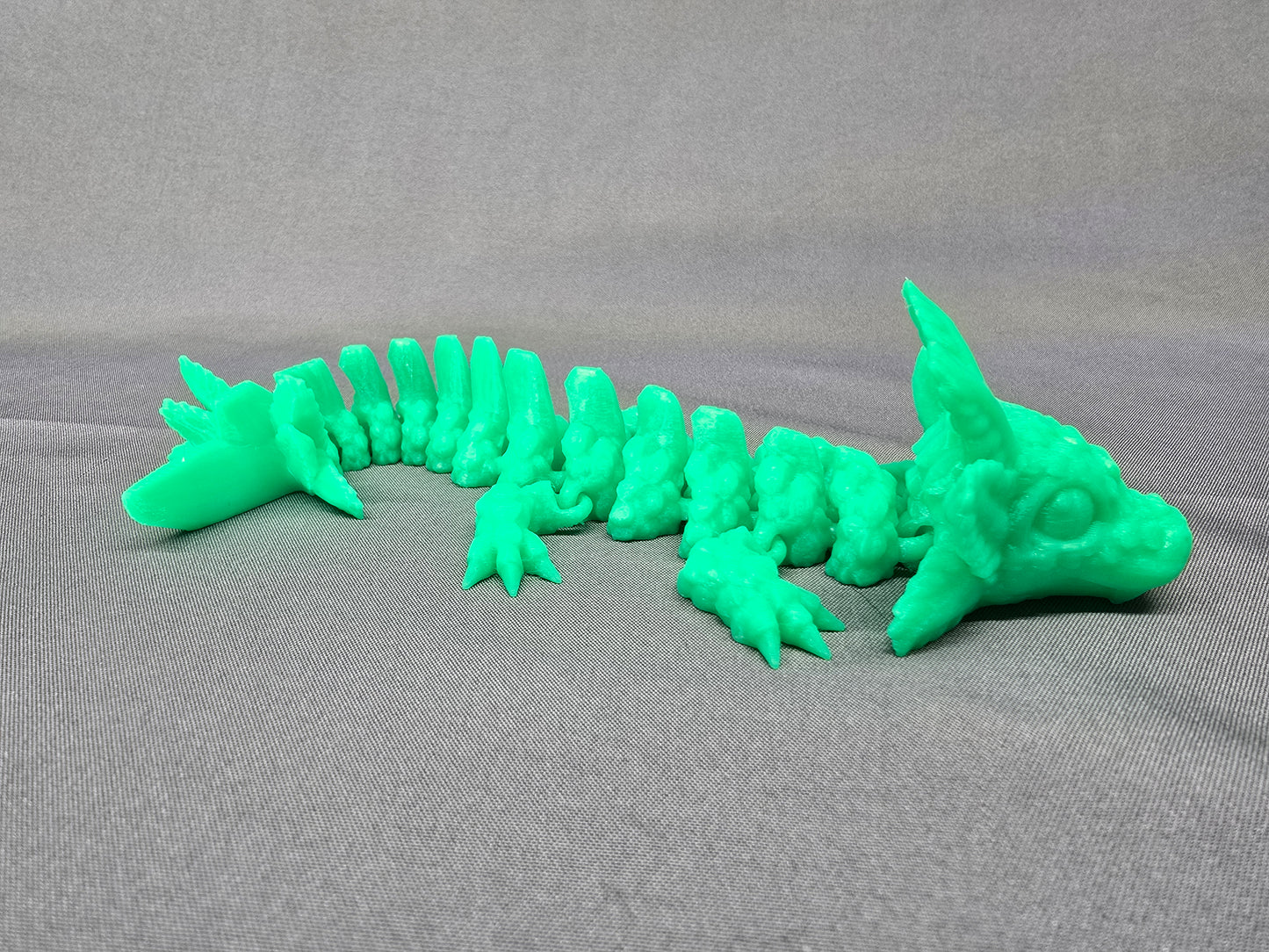 Axolotl Baby Dragon articulating figurine is an adorable fun fidget toy and decoration