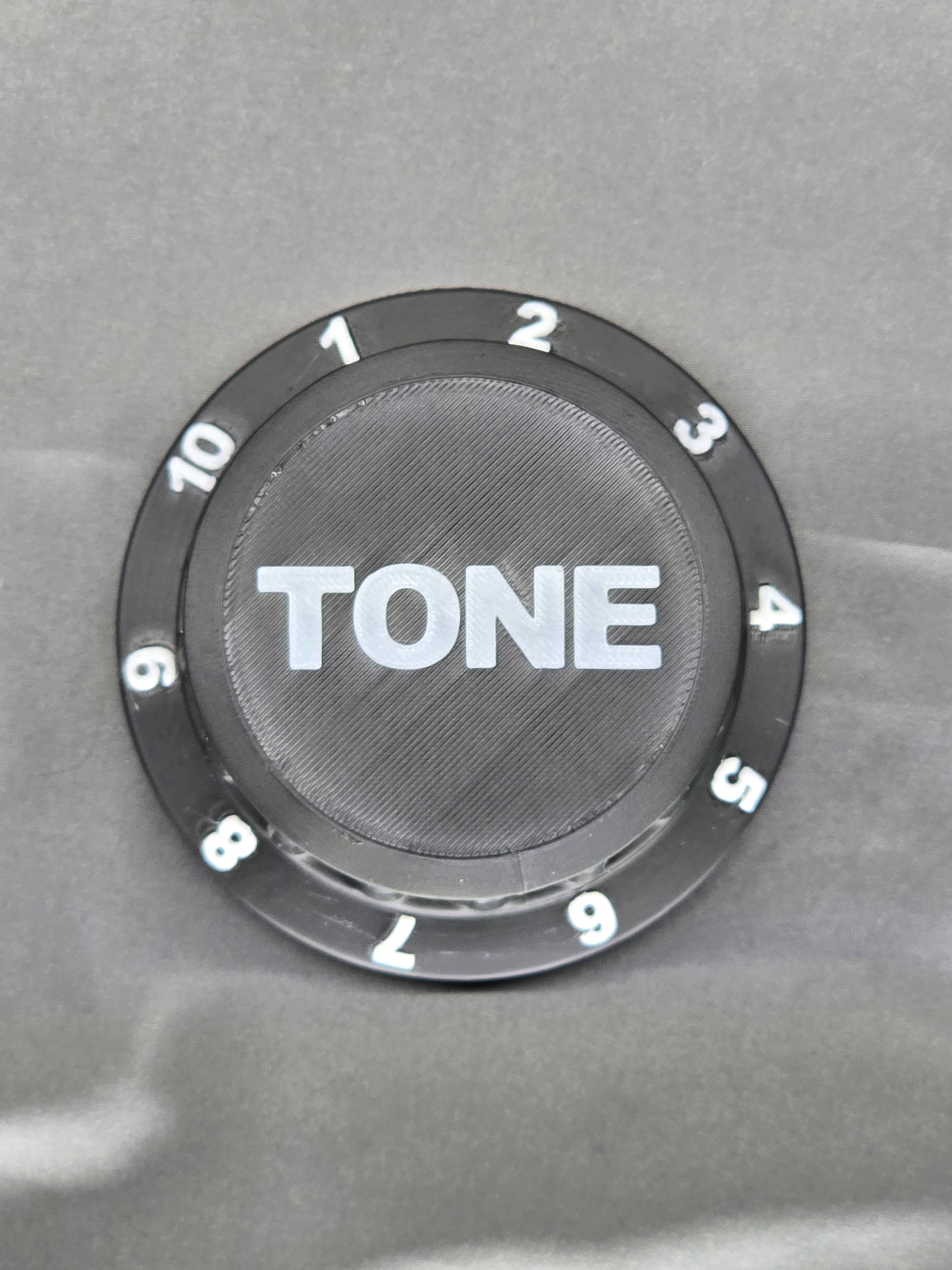 Tone Knob container is the perfect gift that holds everything from guitar picks to 9v batteries for your pedal