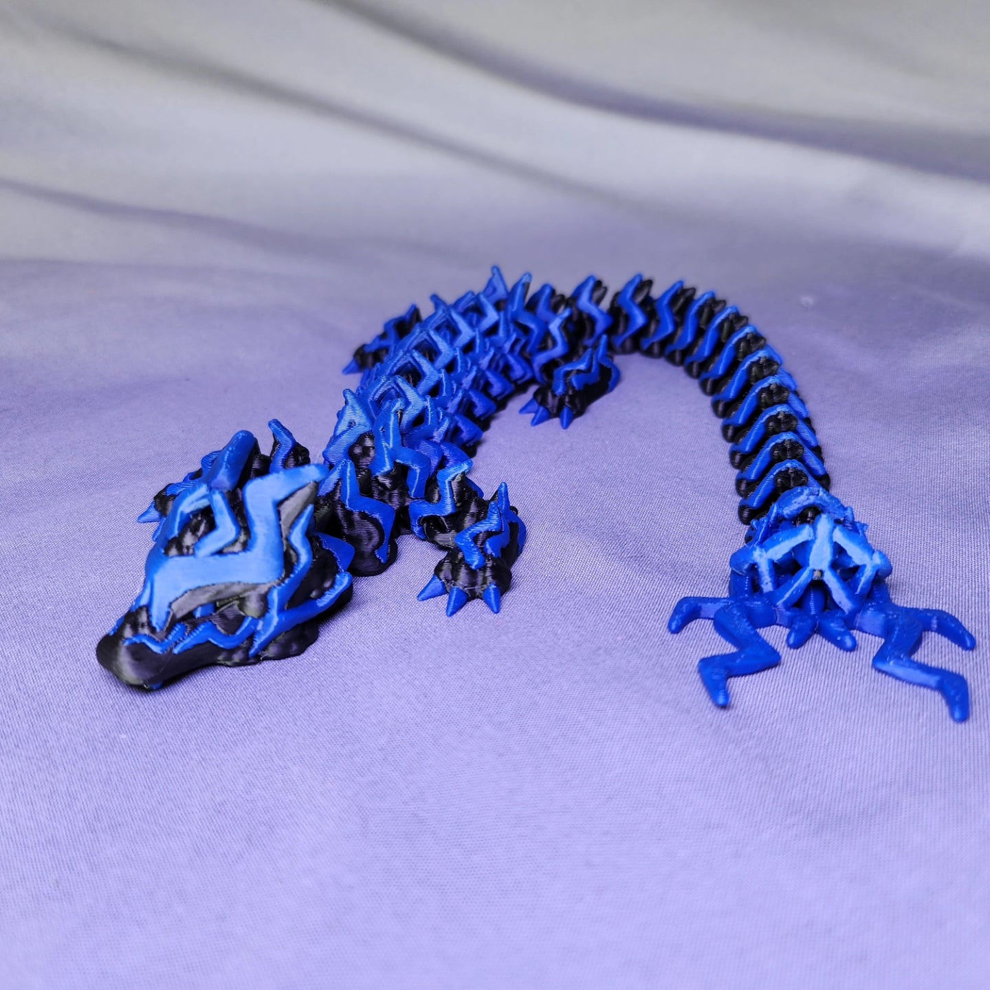 The ThunderStorm Dragon articulating figurine will electrify your life with fun