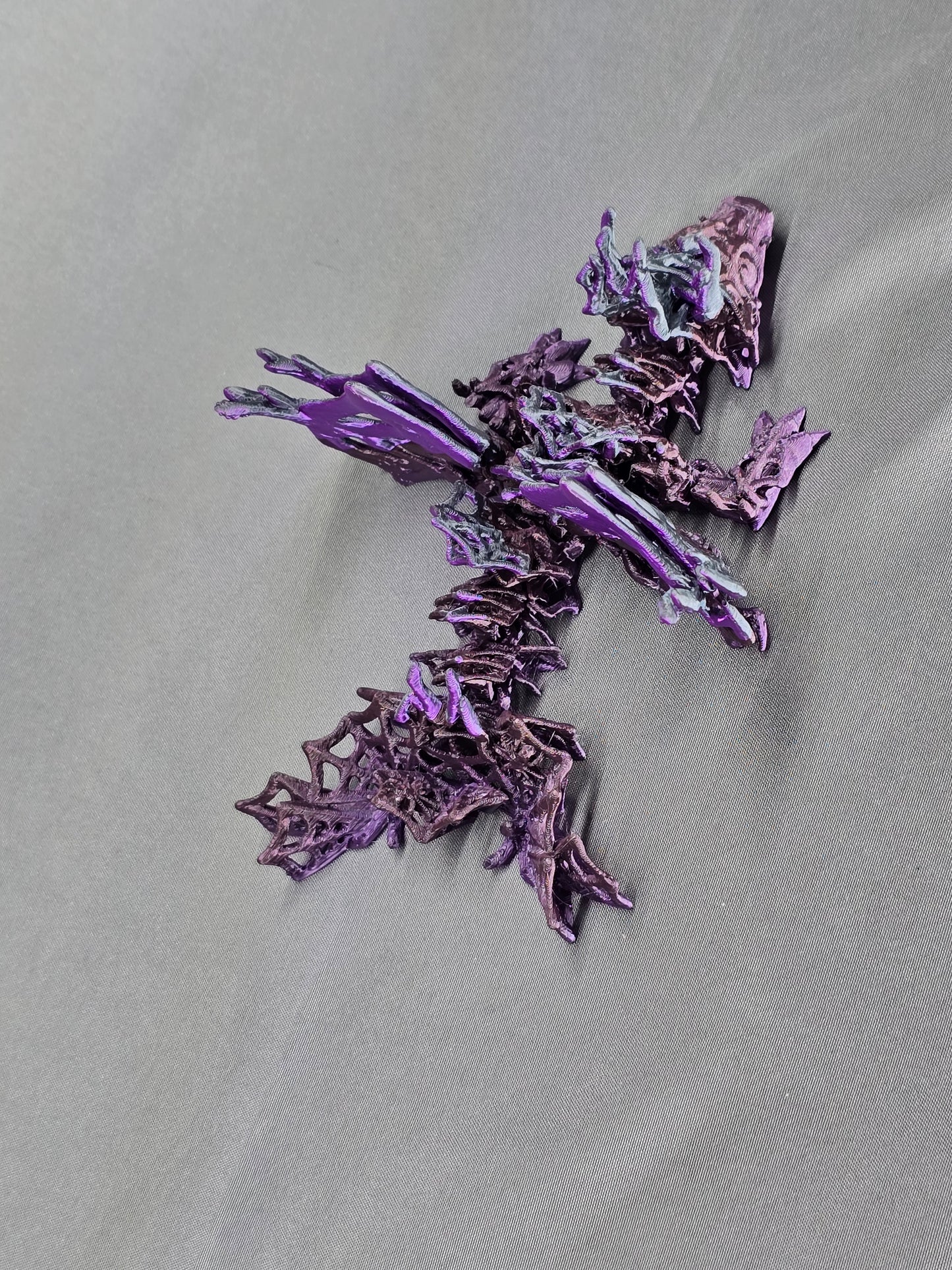 Wicked Web Winged Baby Dragon articulating figurine is a must have with its awesome spiderweb features