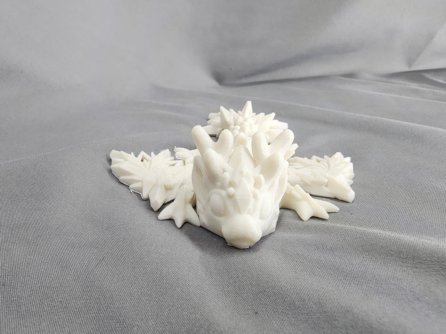 Tiny Winter Dragon articulating figurine