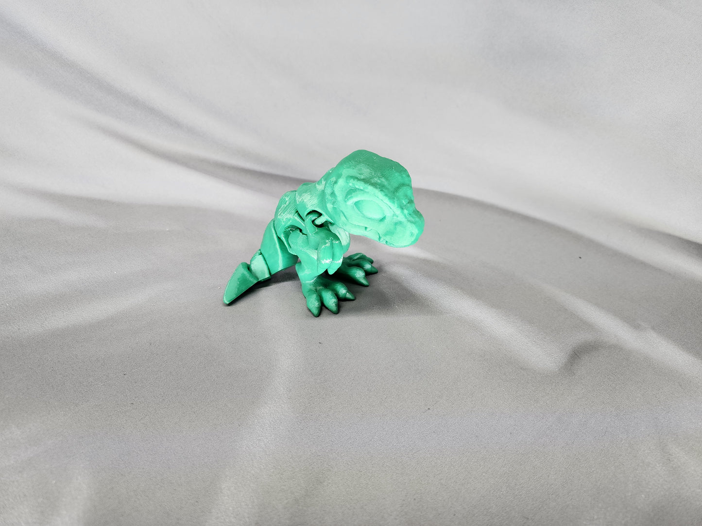 Tiny T-Rex articulating figurine