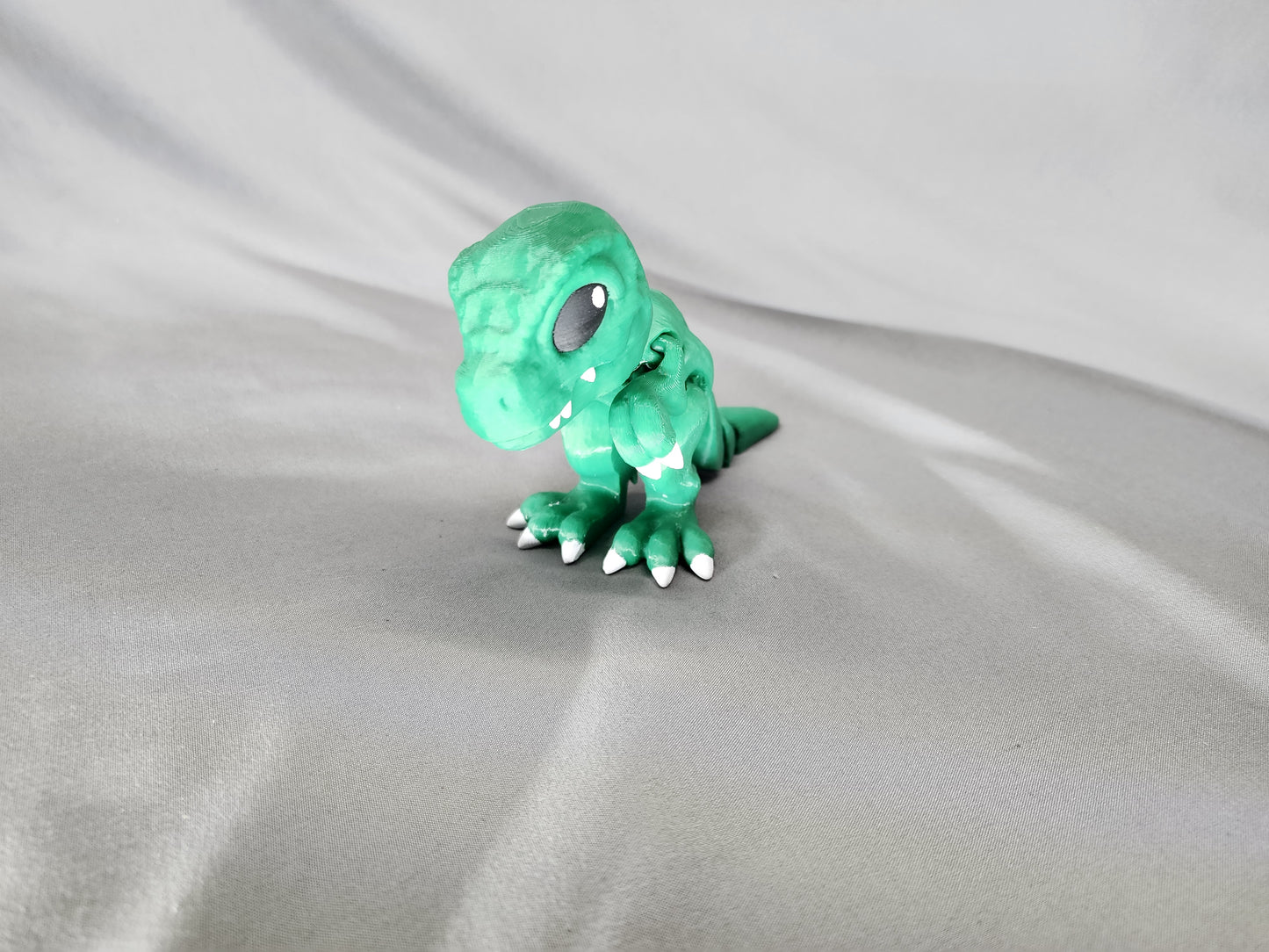 Tiny T-Rex articulating figurine