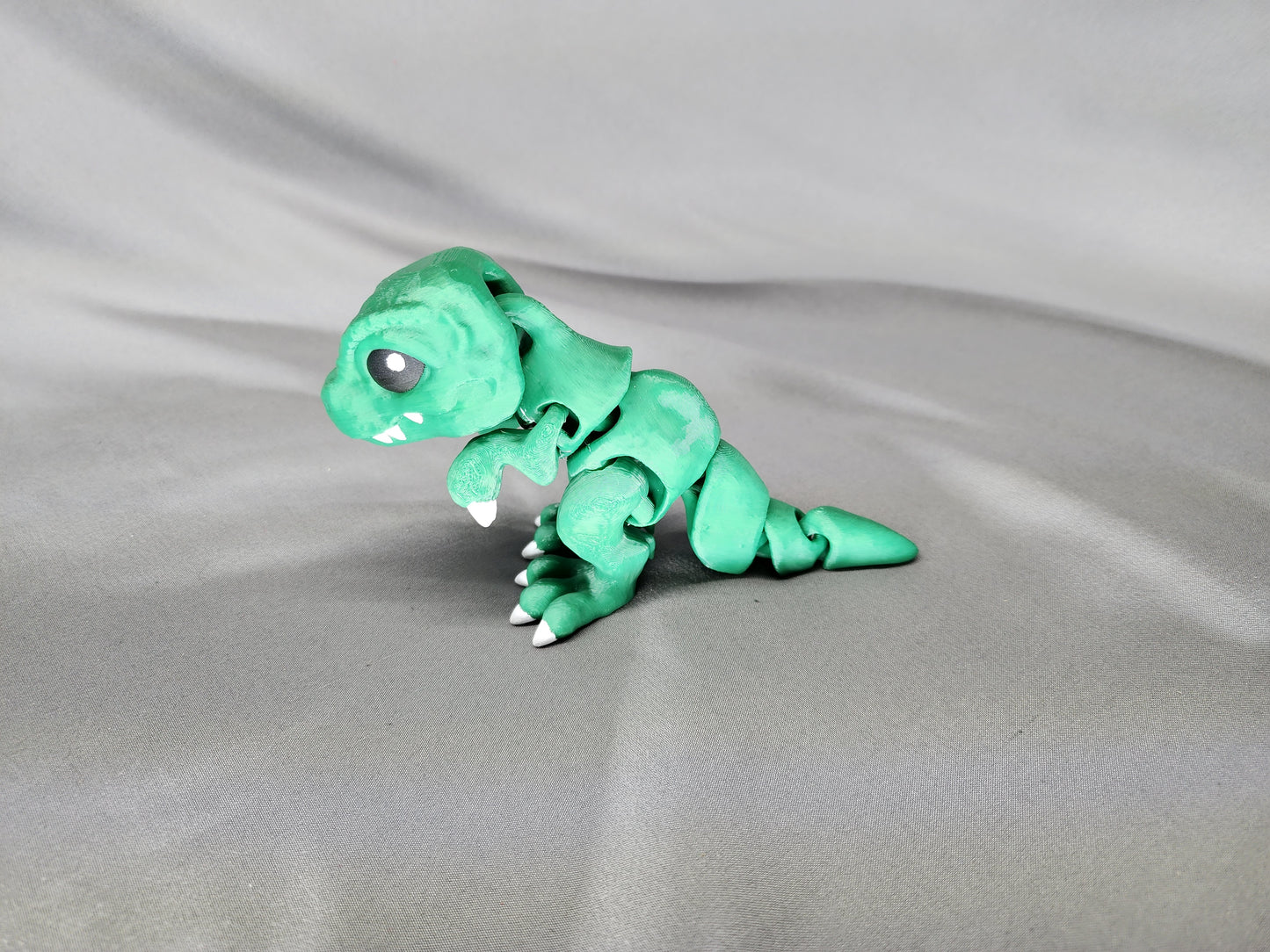 Tiny T-Rex articulating figurine