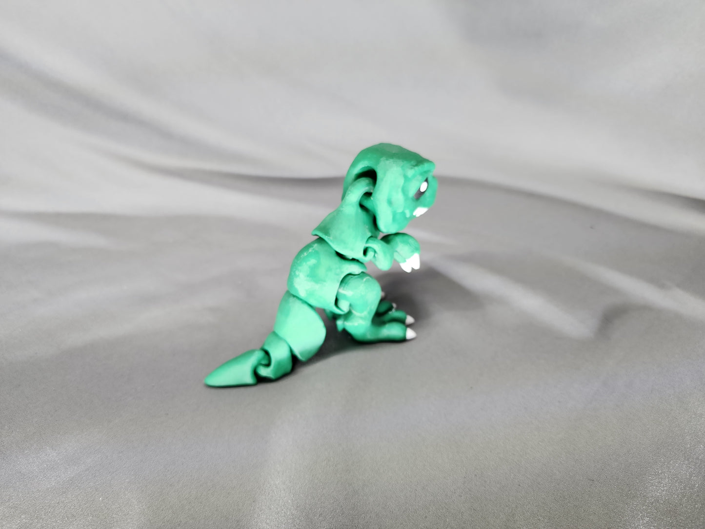 Tiny T-Rex articulating figurine