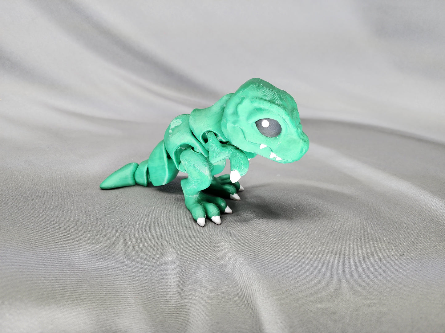 Tiny T-Rex articulating figurine