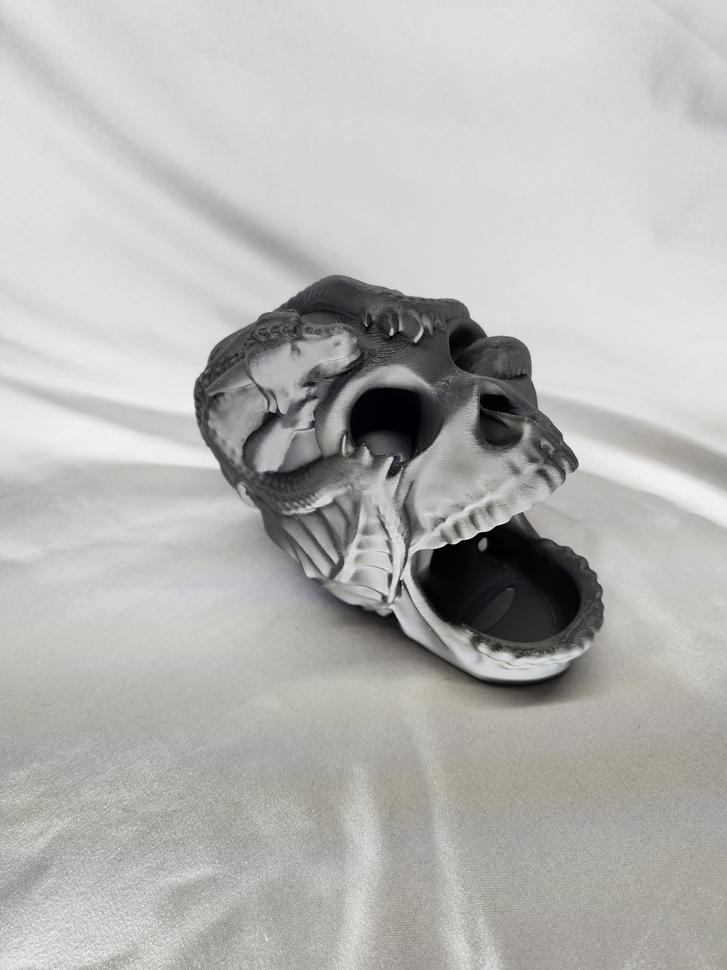 Skull & Dragon Dice Tower doubles as decor to impress friends and family with your dice rolling skills and eccentric gothic vibe