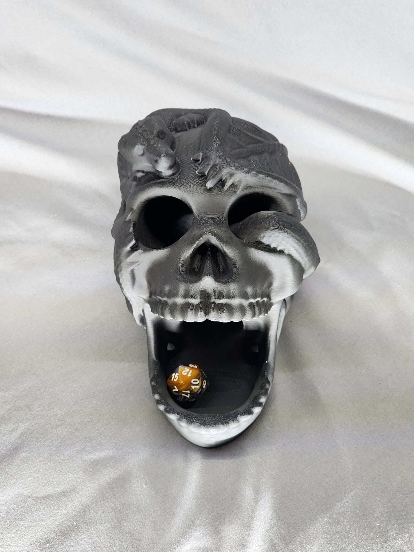 Skull & Dragon Dice Tower doubles as decor to impress friends and family with your dice rolling skills and eccentric gothic vibe