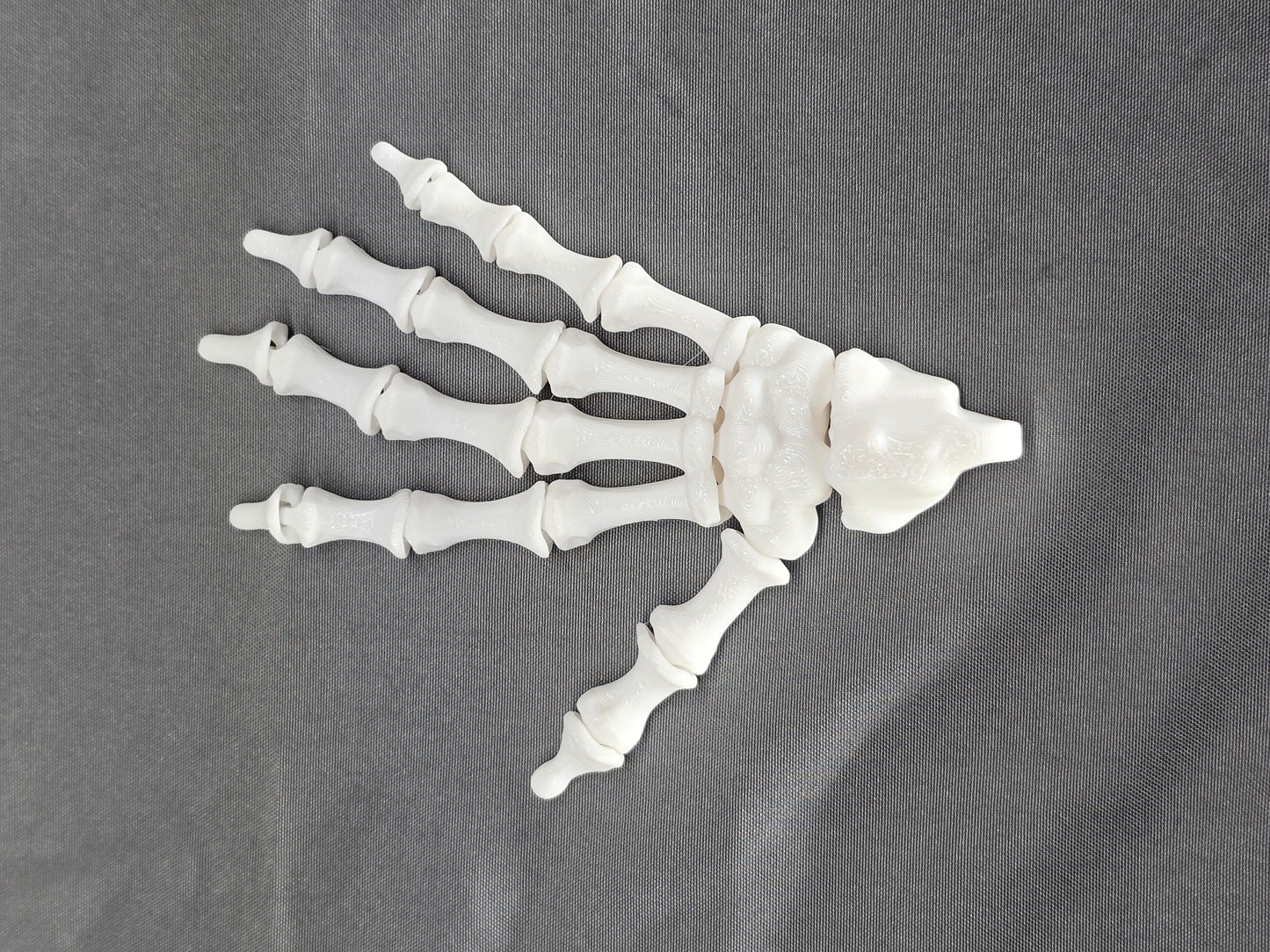 Skeleton keychains - articulating hands, feet and and skulls, we have them all!