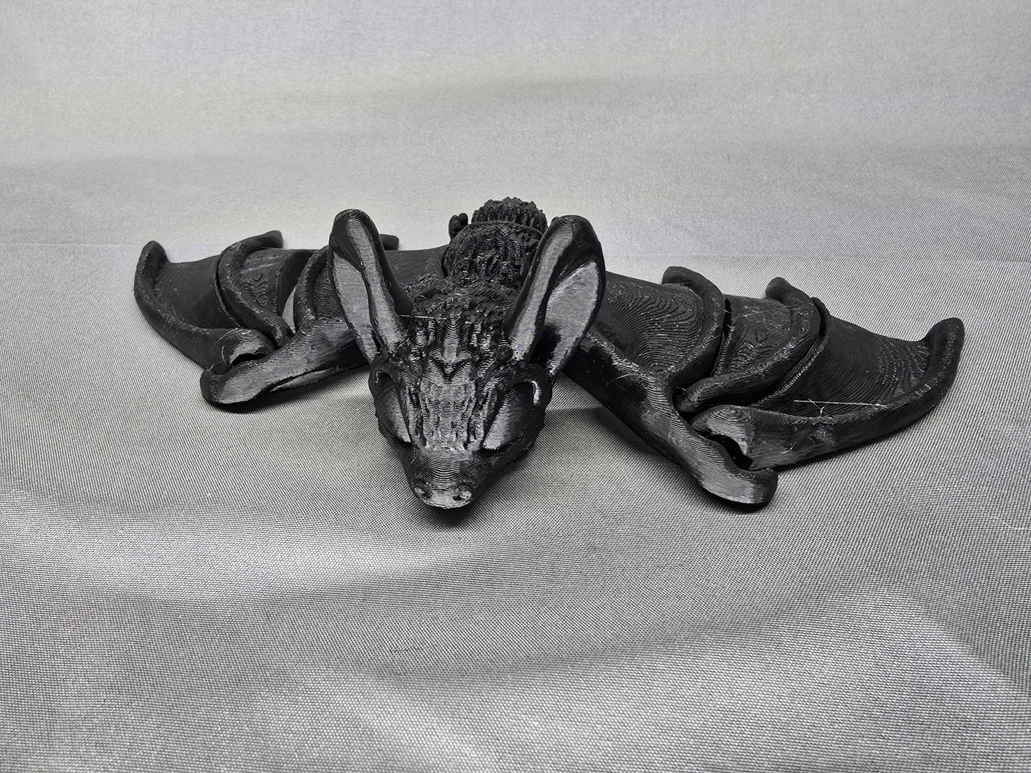 Tiny Bat articulating figurine and Halloween decoration love to hang around and flap its cute little wings