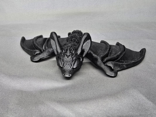 Tiny Bat articulating figurine and Halloween decoration love to hang around and flap its cute little wings