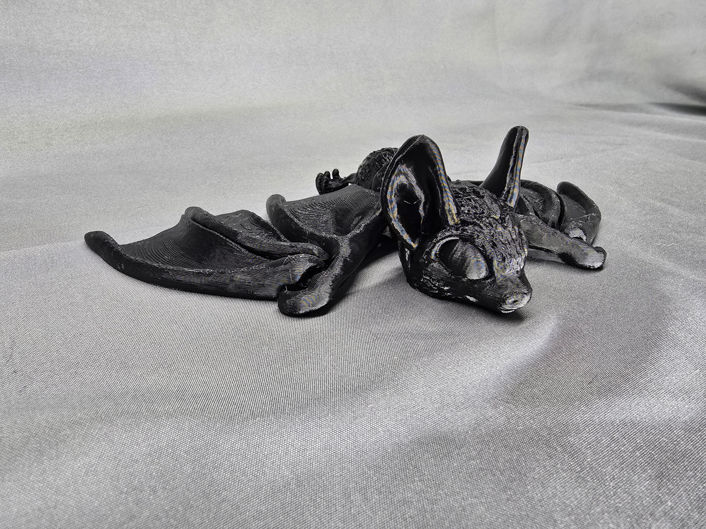 Tiny Bat articulating figurine and Halloween decoration love to hang around and flap its cute little wings