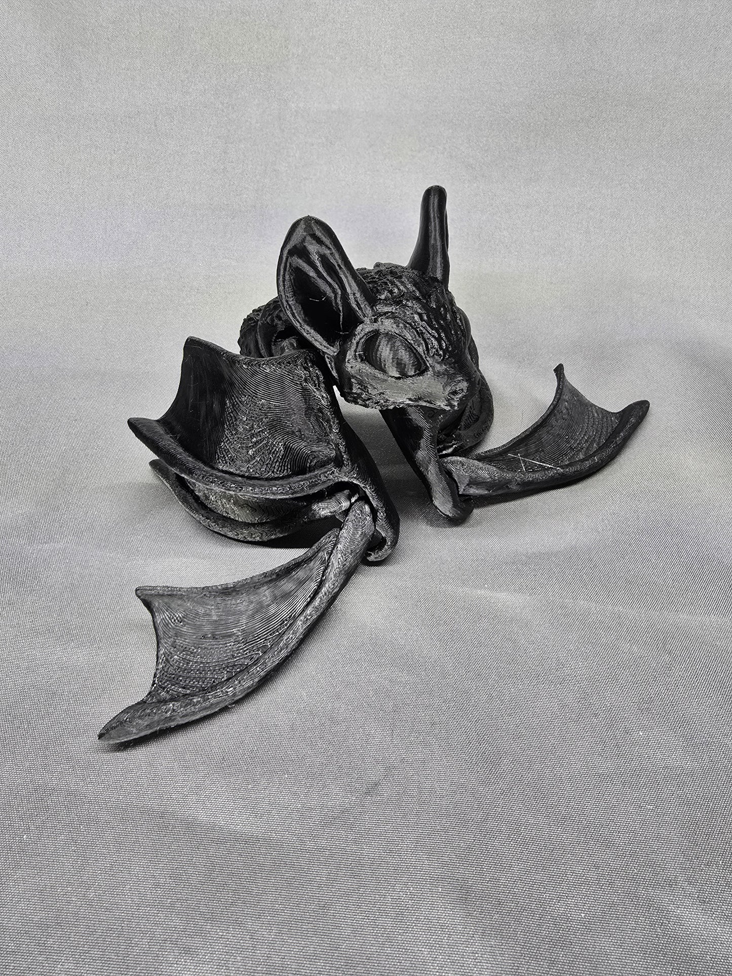 Tiny Bat articulating figurine and Halloween decoration love to hang around and flap its cute little wings