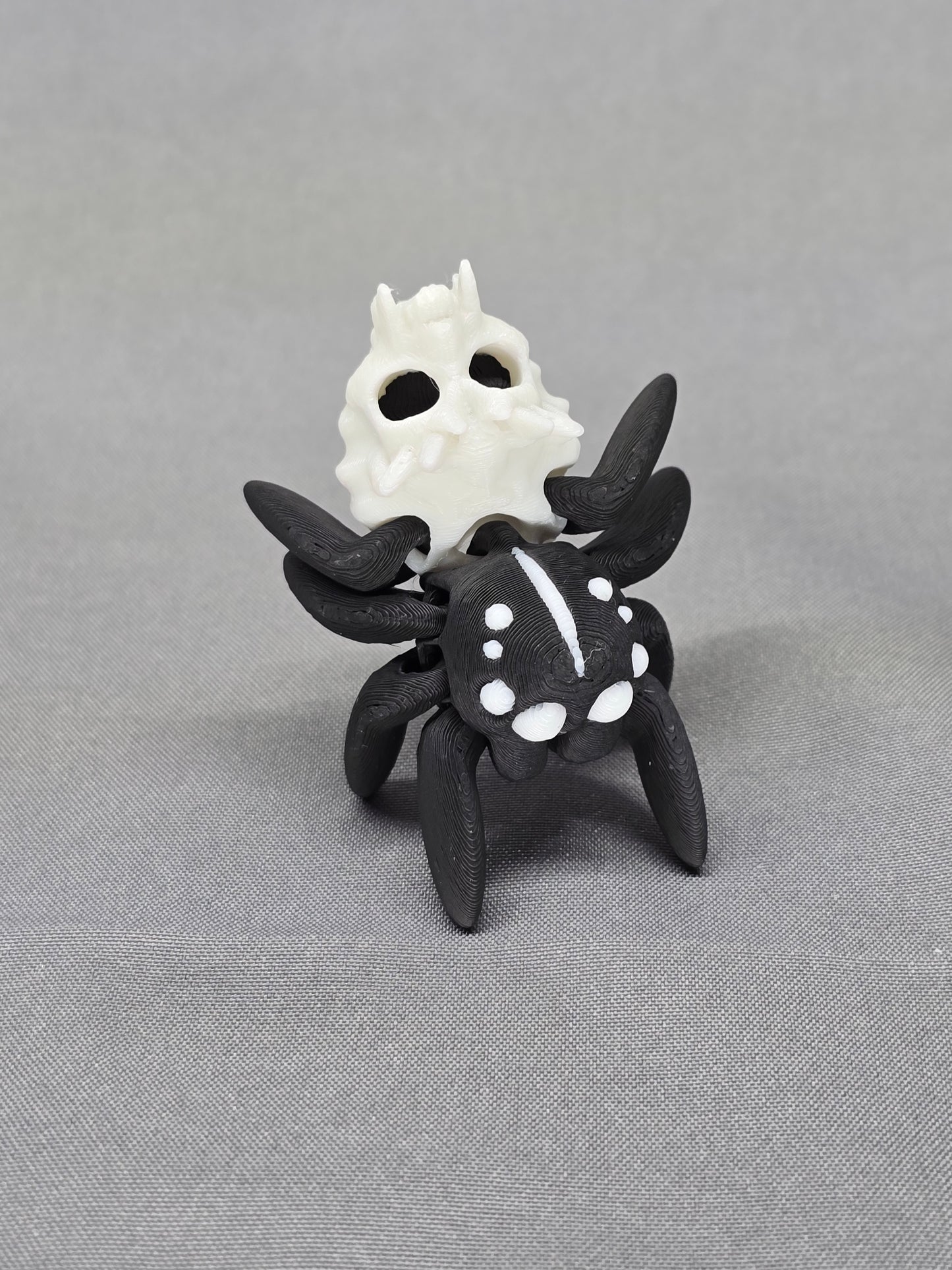 Hollow Skull Spider articulating figurine decoration for Halloween fun