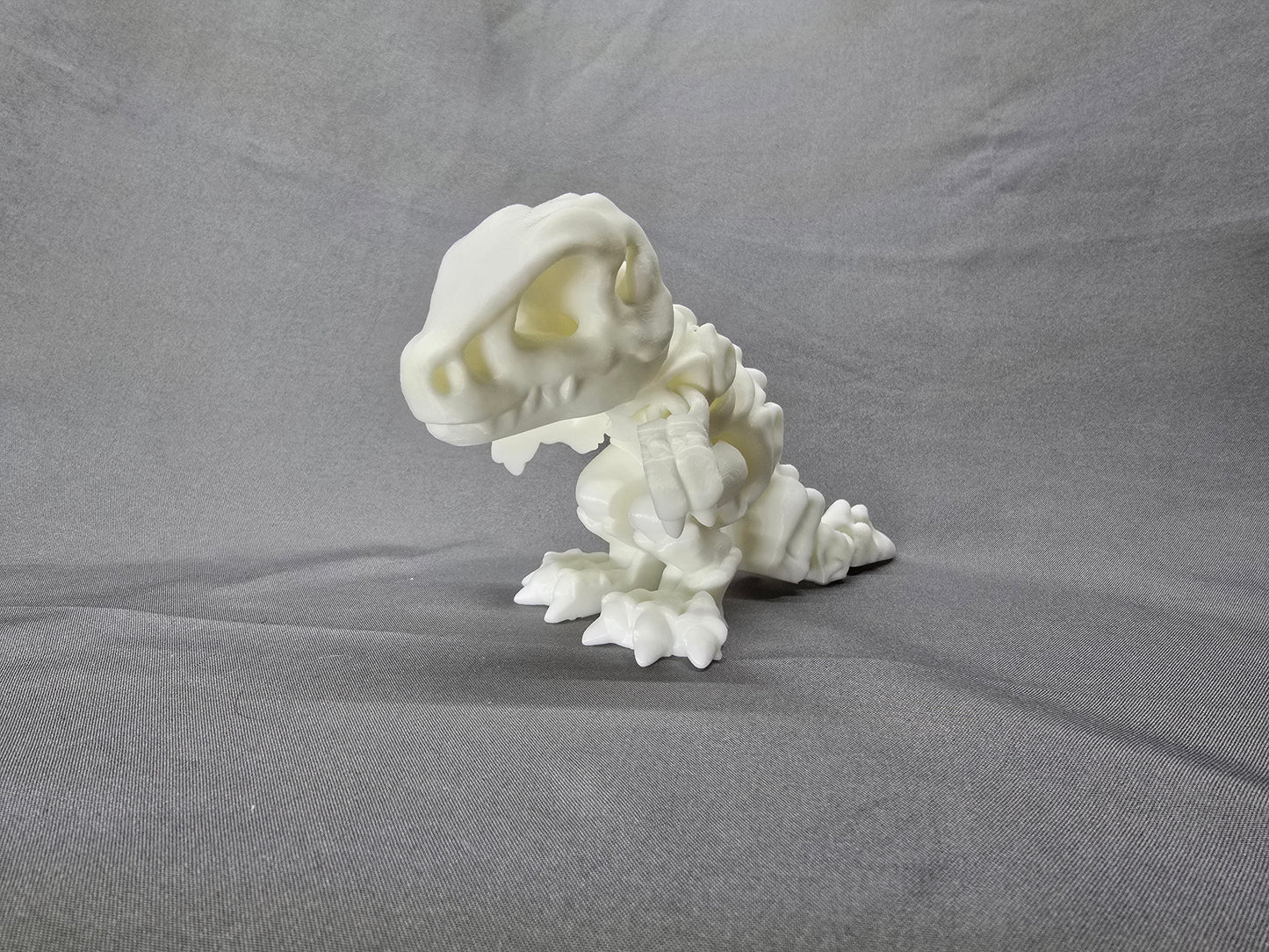 Tiny T-Rex Skeleton articulating figurine