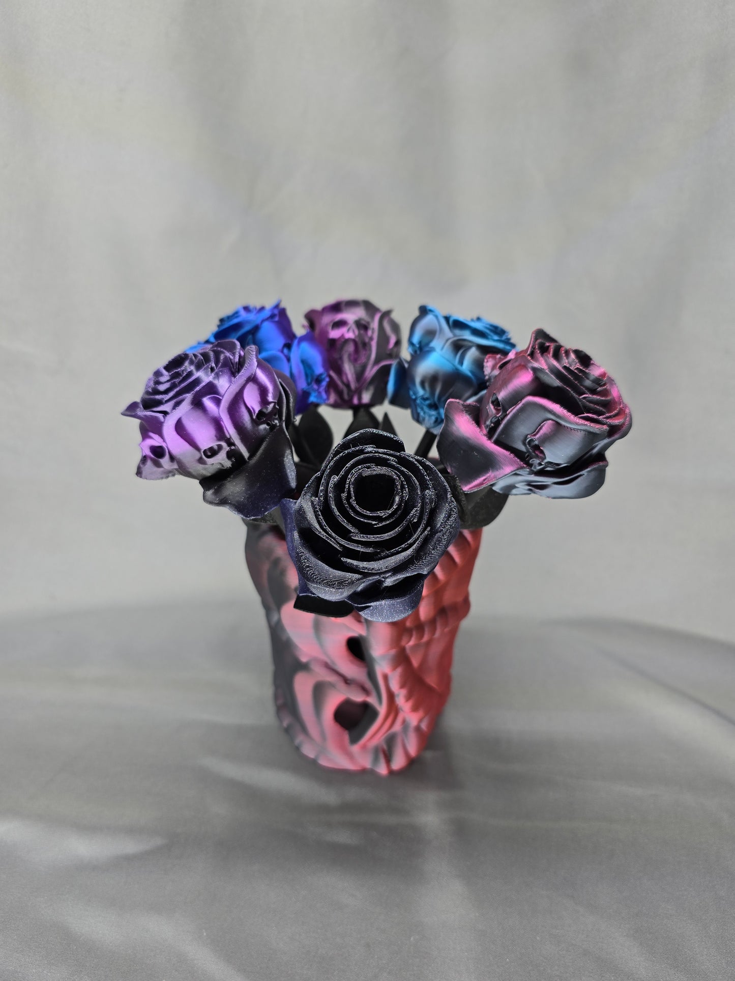 The Forbidden Rose decoration featuring a rose with thorns, 2 leafs and petals with skulls