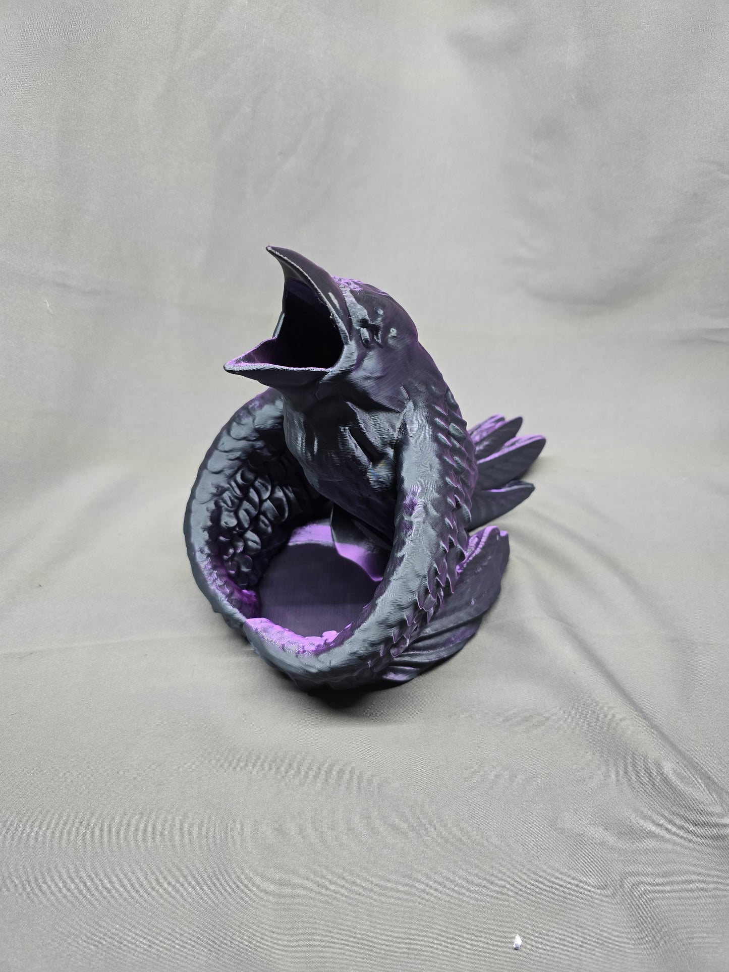Raven Dice Tower will roll your dice in style and keep an eye on them. Perfect for D&D and other dice roll games.