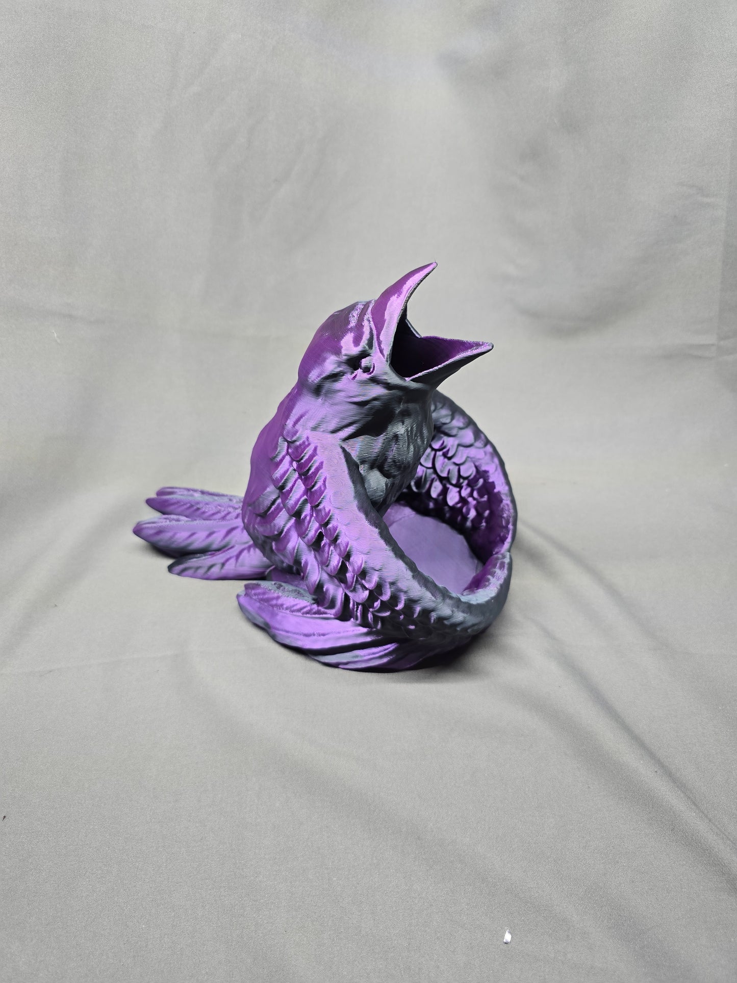 Raven Dice Tower will roll your dice in style and keep an eye on them. Perfect for D&D and other dice roll games.